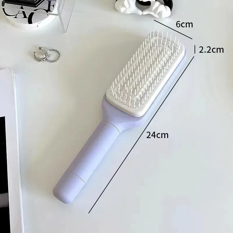 SELF CLEANING ROTATING HAIR COMB