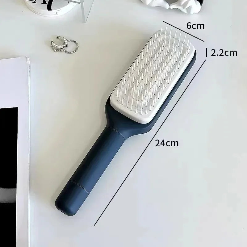 SELF CLEANING ROTATING HAIR COMB